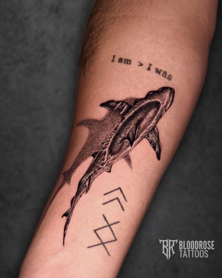 Black and grey shark forearm tattoo